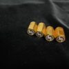 Gold Valve caps M logo