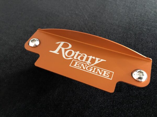 Orange rotary engine flywheel cover