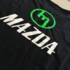 Green M - Black Singlet