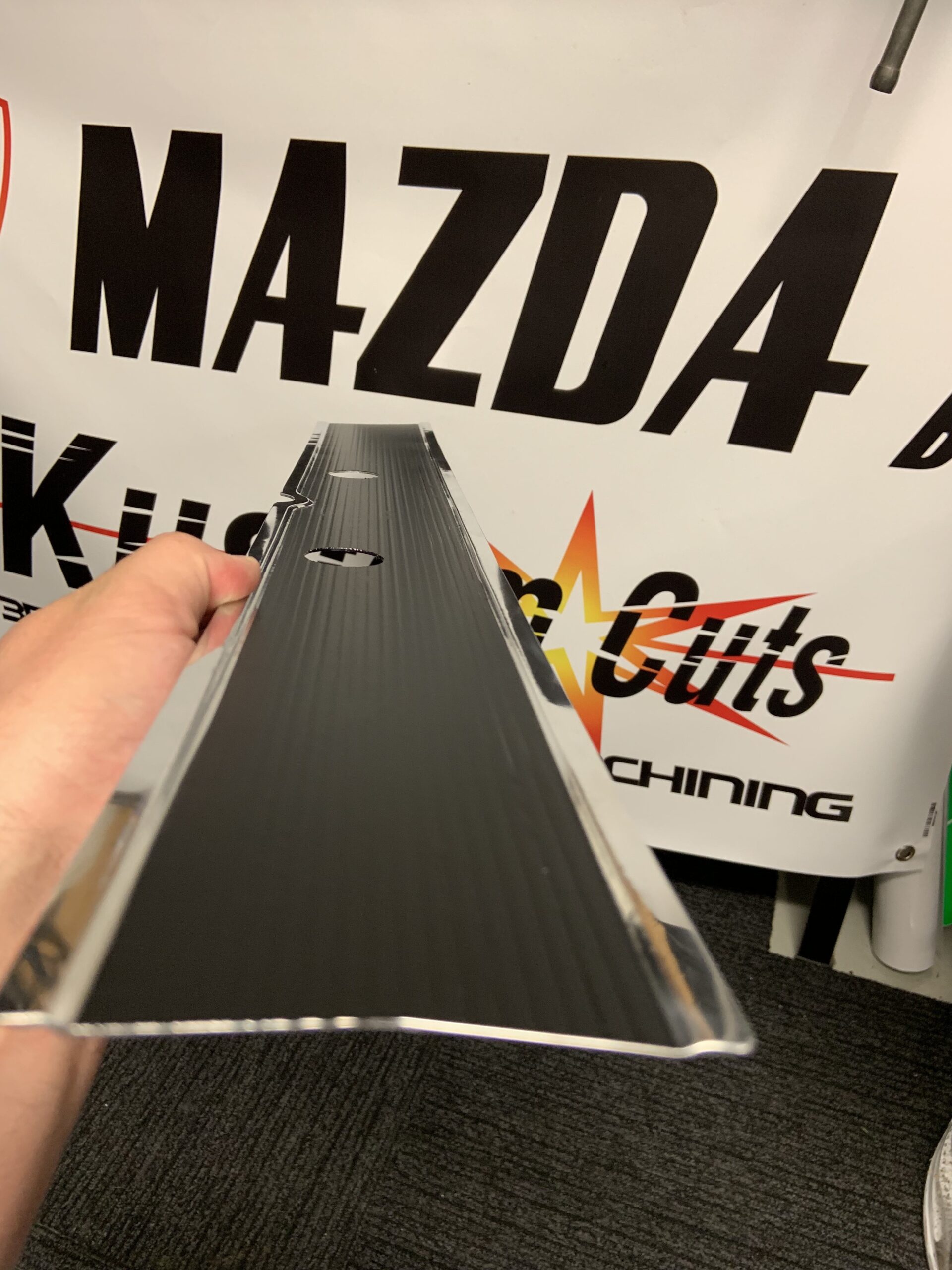 Mazda 1300 STB Alloy Garnish