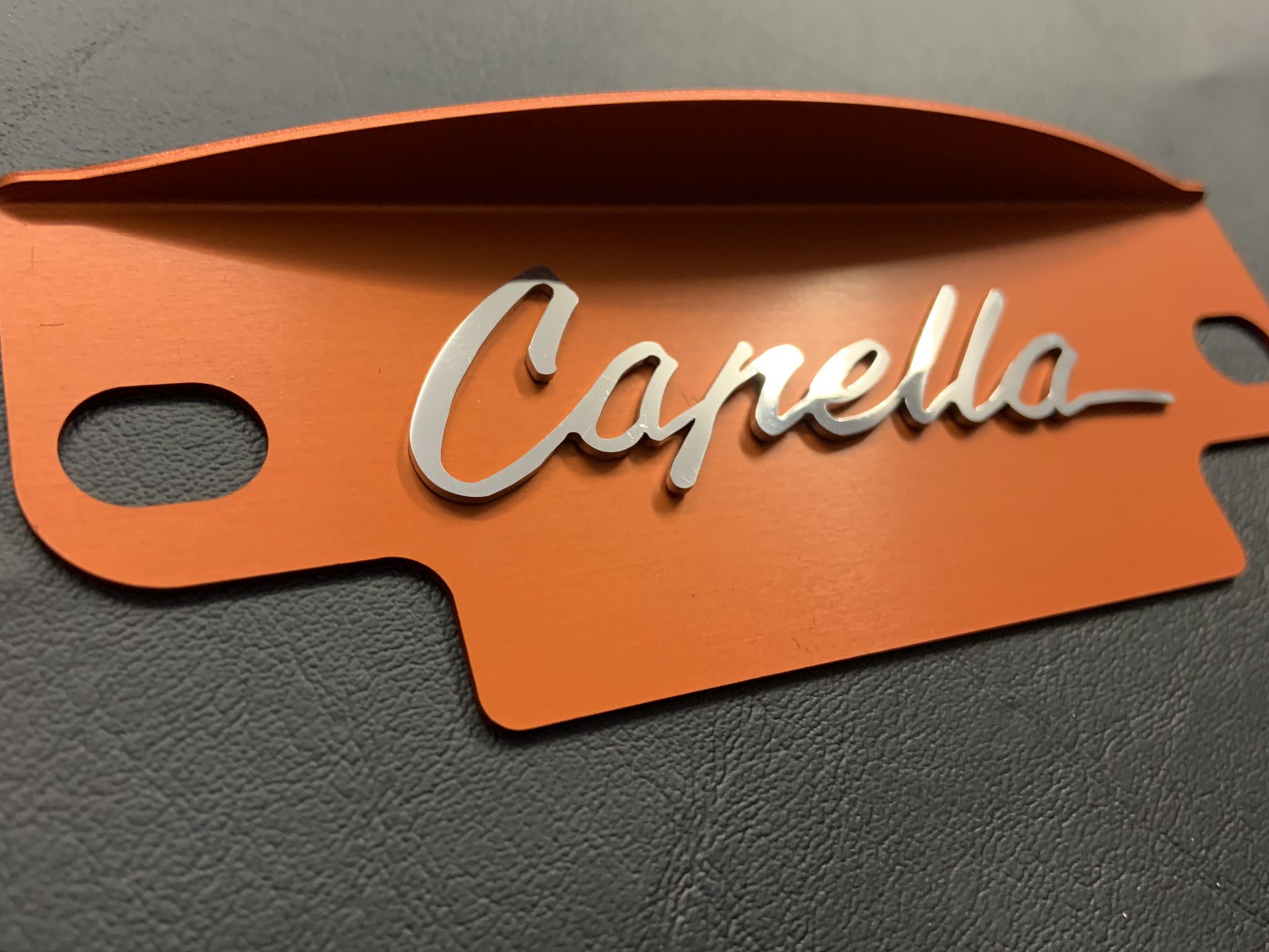 Orange 12a / 13b Alloy flywheel cover with polished Capella