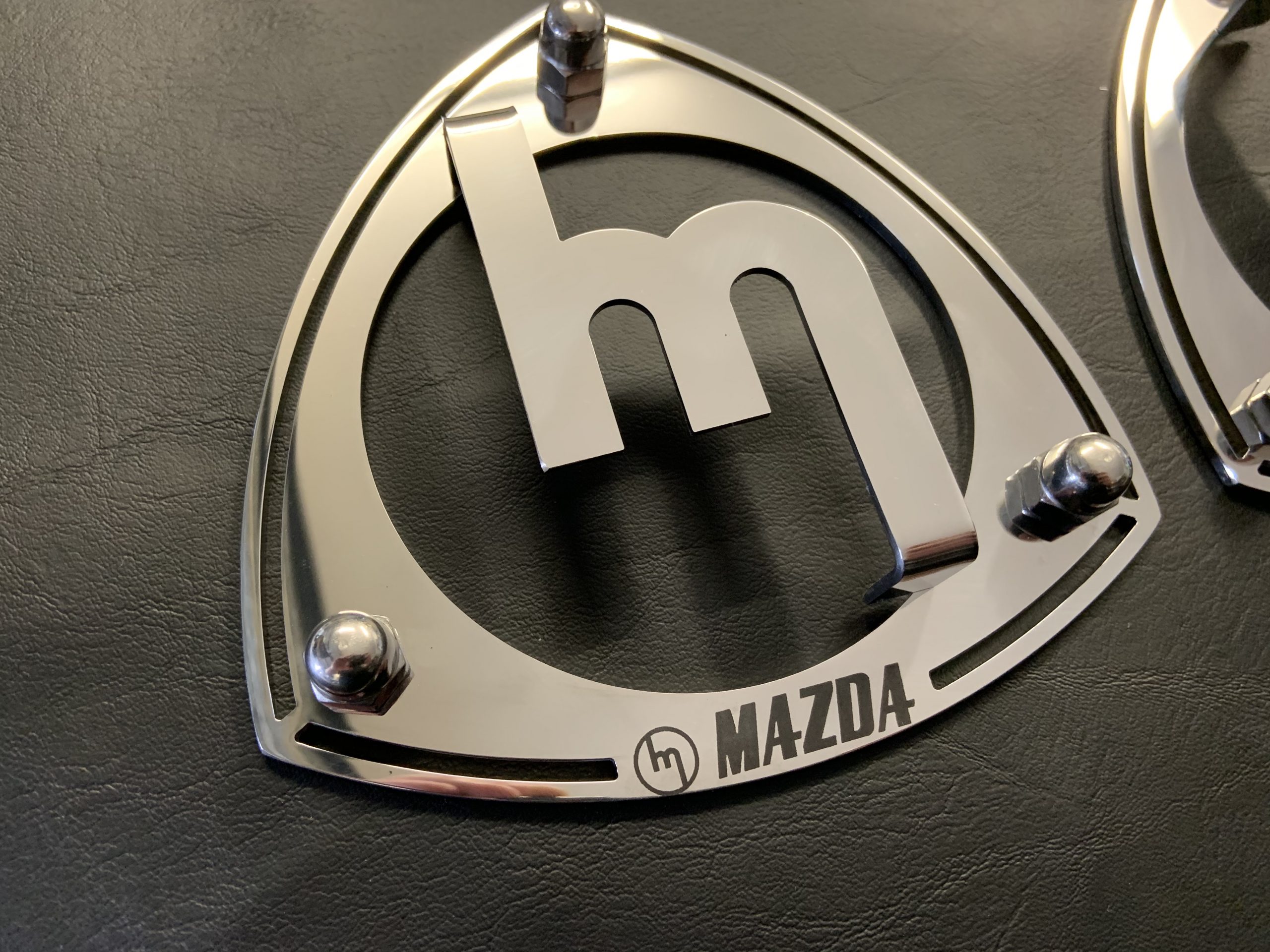 Rx3/808/323 Polished Stainless with raised M