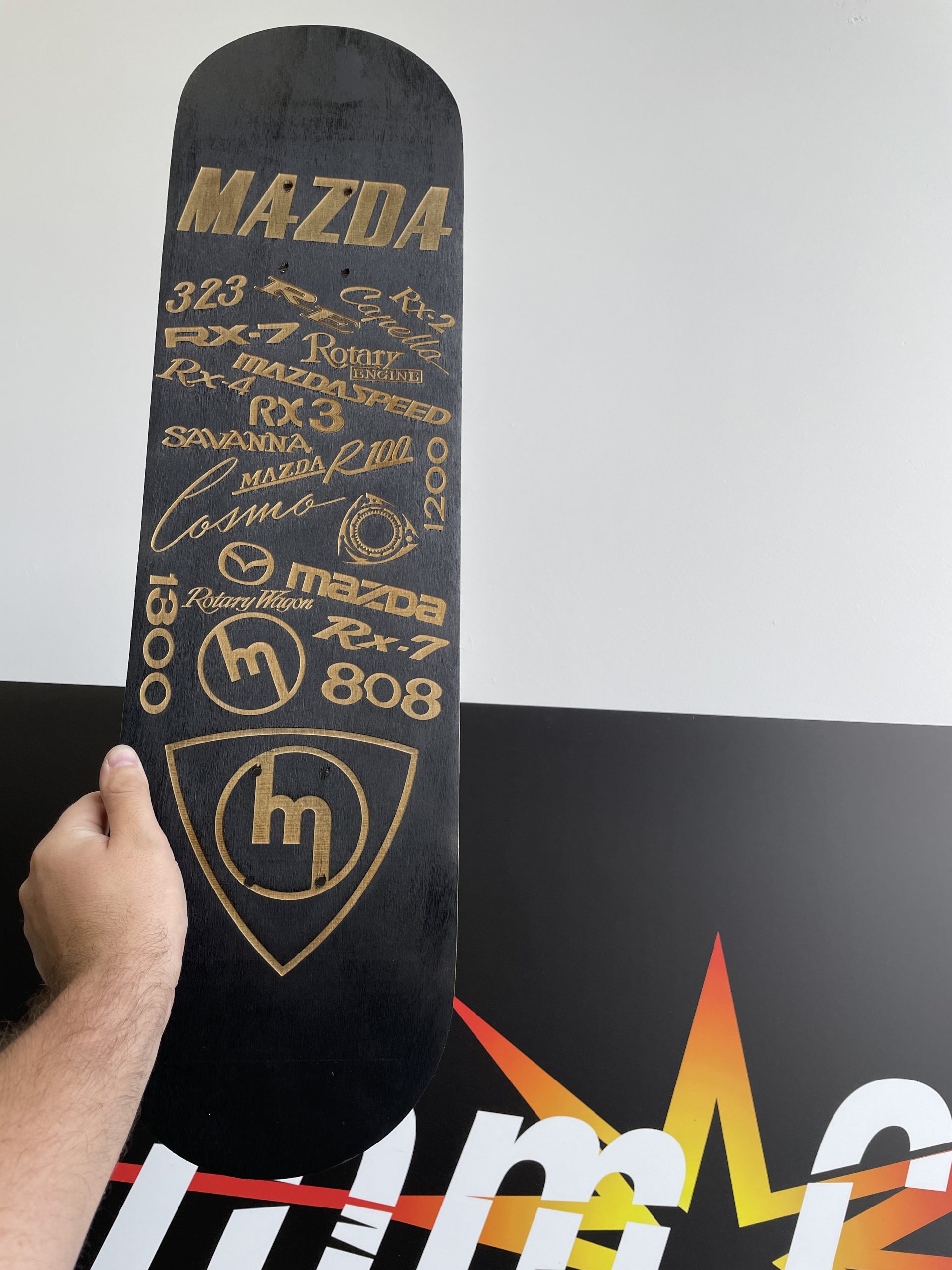 Black Mazda Logo Skateboard