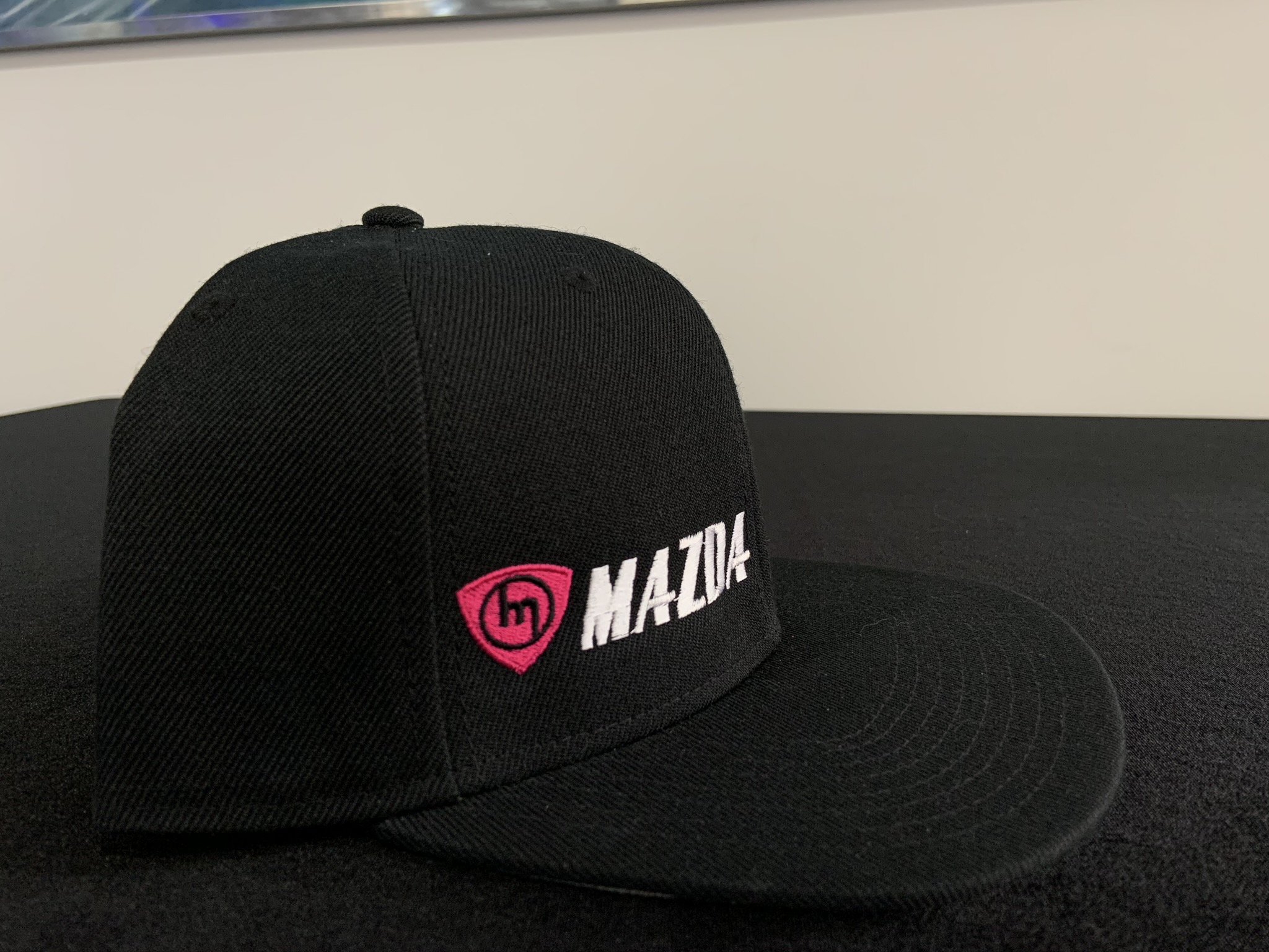 Black SnapBack Pink M logo