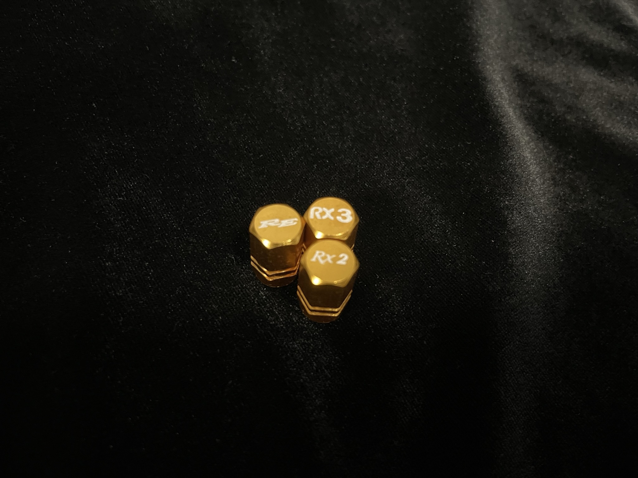 Gold Valve Caps Rx2 logo
