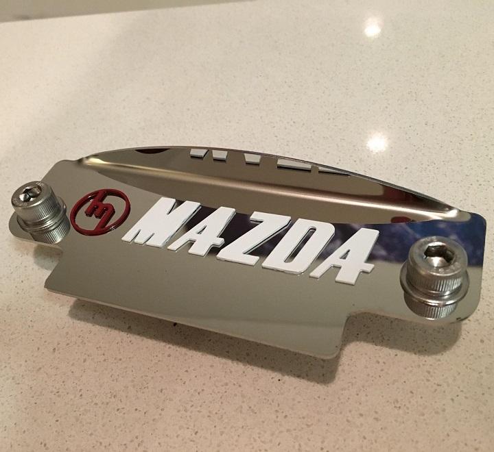 Red M white Mazda 12a flywheel cover